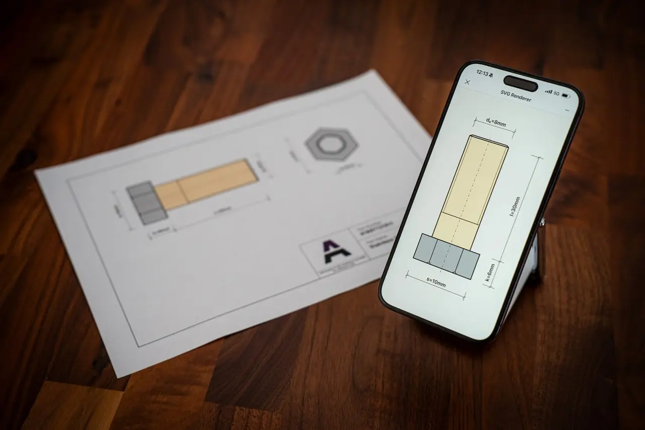 A printed technical PDF with screw dimensions lies next to a phone on a stand showing the same screw as an SVG-based illustration.